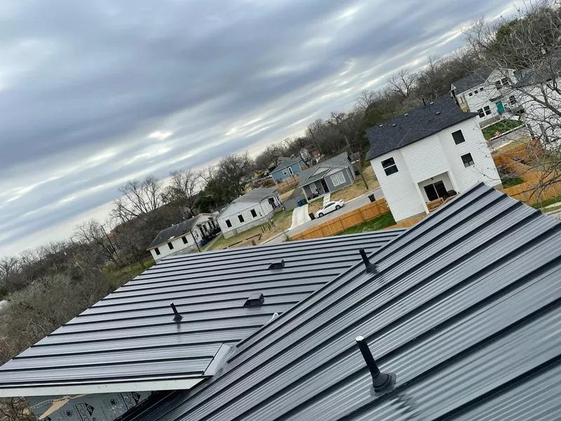 Standing seam metal roof panels with vents for Skylight Repair in Forest Hills